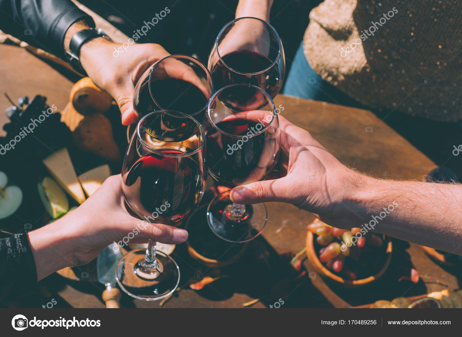 depositphotos_170489256-stock-photo-clinking-glasses